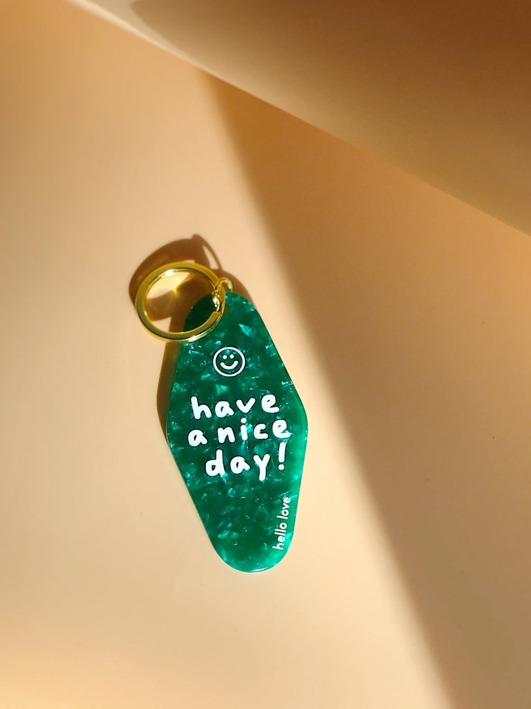 Schlüsselanhänger Have A Nice Day Emerald